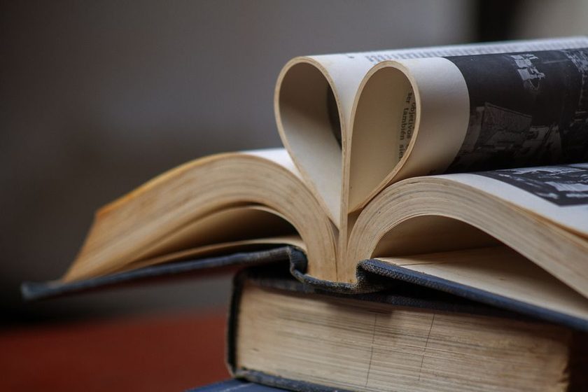 Close-up of a torn book signature fold